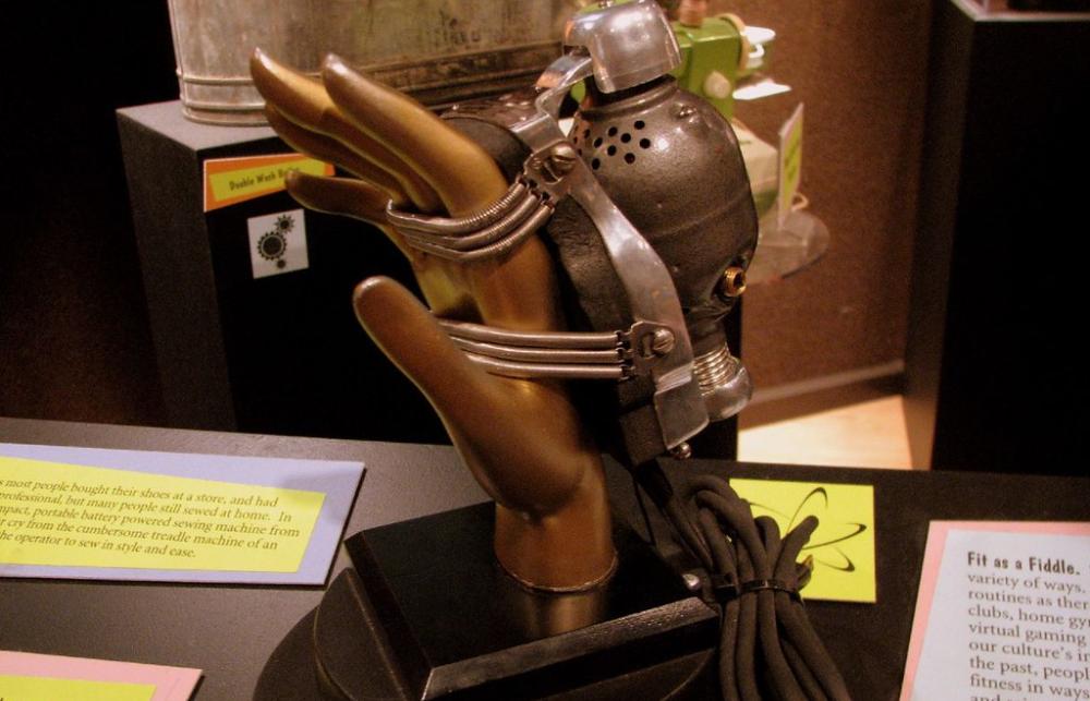 Sculpted image of a hand on display in a museum