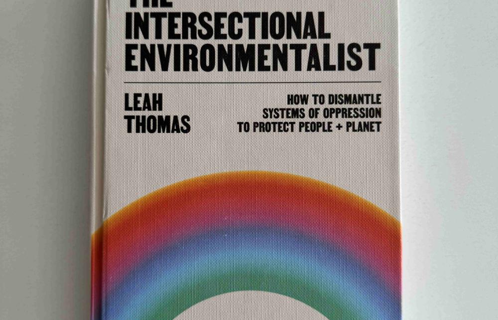 Photo of the front cover of Leah Thomas' book 'The Intersectional Environmentalist: How to Dismantle Systems of Oppression to Protect People + Planet'